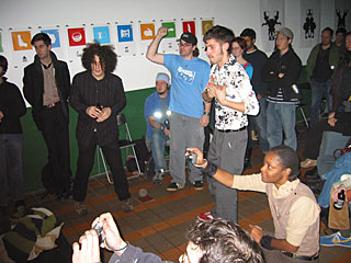 The audience looks on.  2003 12 11, image 31 of 44.