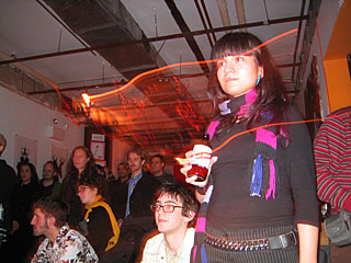 The audience looks on.  2003 12 11, image 32 of 44.