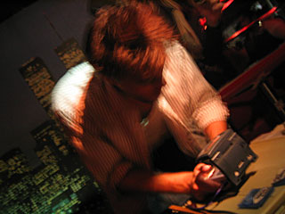 Logic Bomb performs, 2004 11 18, image 27 of 54.